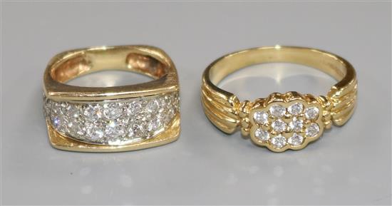 A modern 18ct gold and diamond cluster ring and a 14ct gold and twin row diamond dress ring.